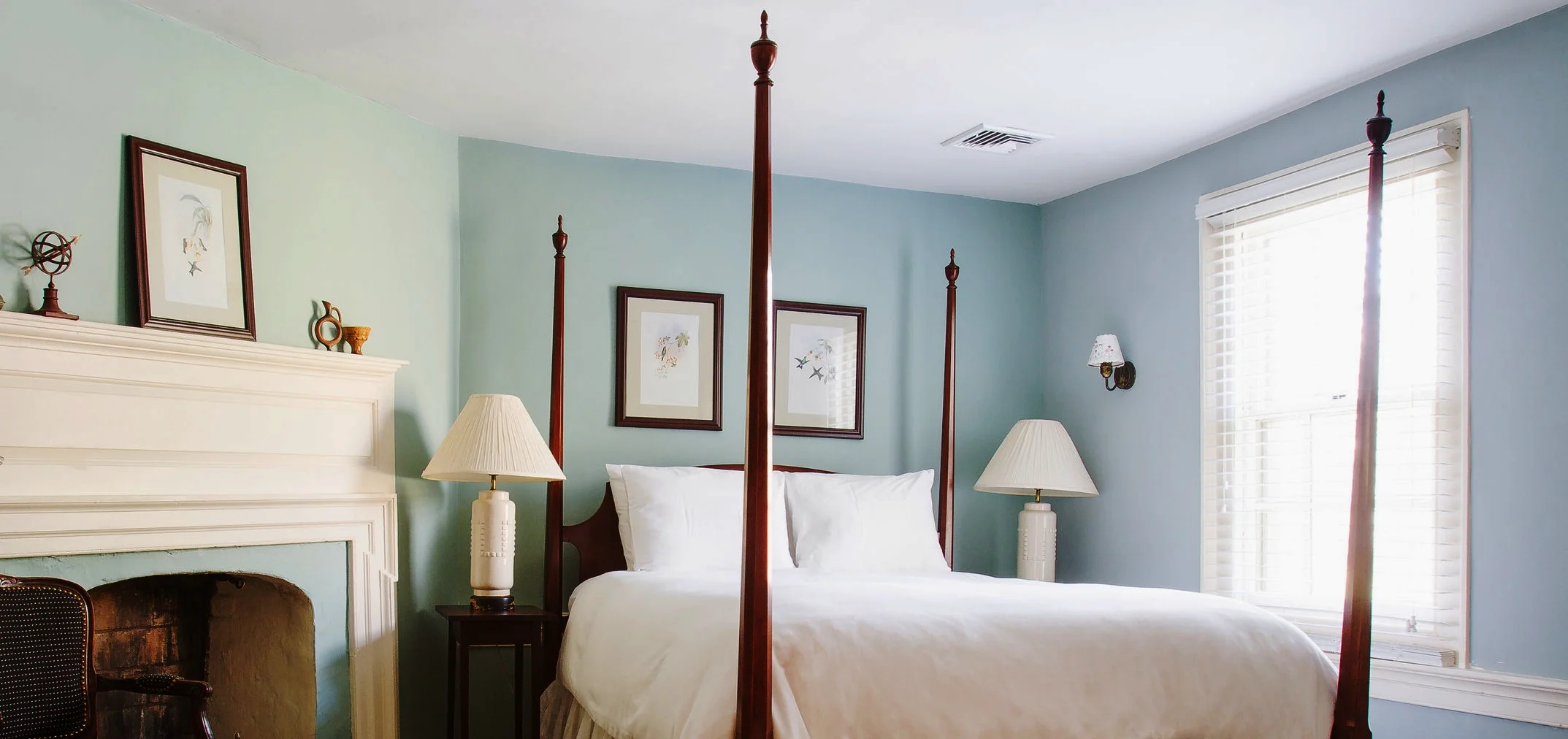 The Gulick Room with our four poster bed and view of the back garden.